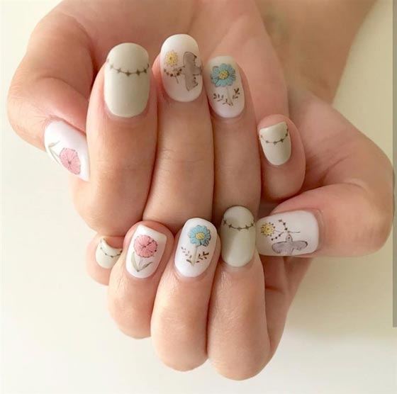 تصاميم رقيقة وناعمة لرسومات أظافر رائعة لفتاة كورية.. صور